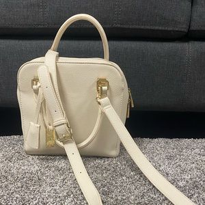 Charming Charles adjustable cross body purse